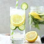 How much water should I consume to flush out toxins and detoxify the body?