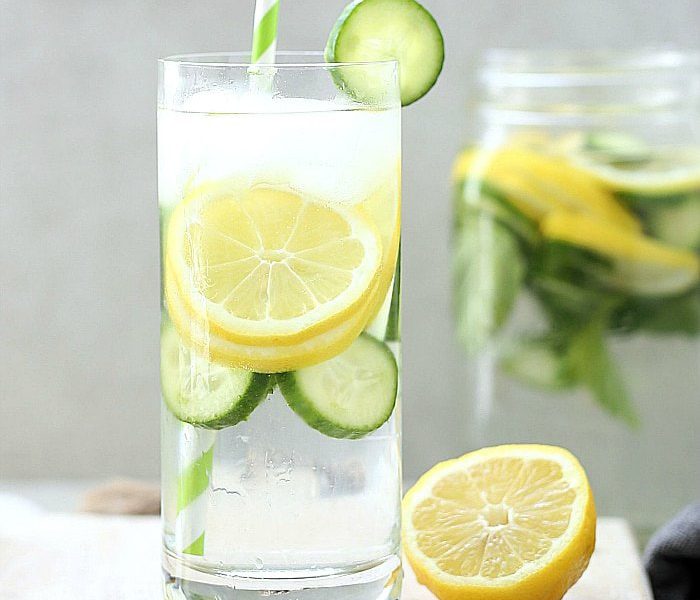 How much water should I consume to flush out toxins and detoxify the body?